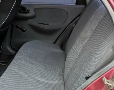 Червоний Деу Ланос, об'ємом двигуна 1.5 л та пробігом 313 тис. км за 2400 $, фото 7 на Automoto.ua