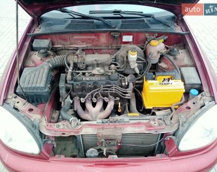 Красный Дэу Ланос, объемом двигателя 1.5 л и пробегом 322 тыс. км за 2300 $, фото 15 на Automoto.ua