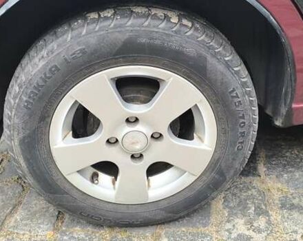 Красный Дэу Ланос, объемом двигателя 1.5 л и пробегом 128 тыс. км за 3550 $, фото 9 на Automoto.ua