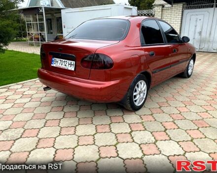 Красный Дэу Ланос, объемом двигателя 1.5 л и пробегом 190 тыс. км за 2650 $, фото 2 на Automoto.ua