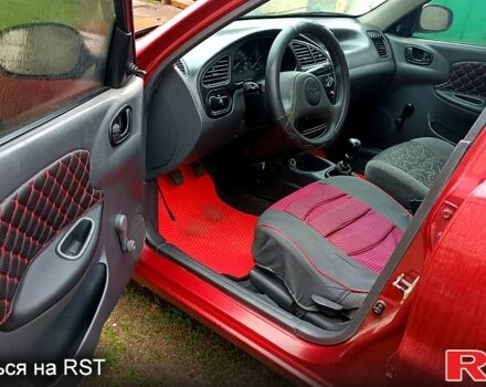 Красный Дэу Ланос, объемом двигателя 1.5 л и пробегом 163 тыс. км за 2200 $, фото 5 на Automoto.ua