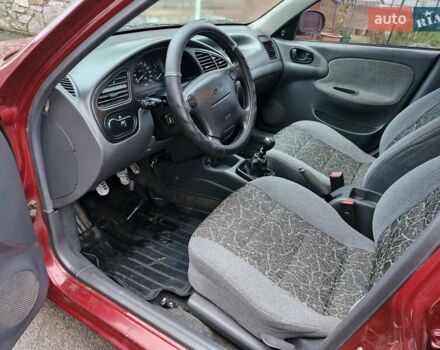 Красный Дэу Ланос, объемом двигателя 1.6 л и пробегом 163 тыс. км за 2650 $, фото 14 на Automoto.ua