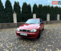 Деу Ланос 2006 у Василькове на Automoto.ua Червоний Деу Ланос, об'ємом двигуна 1.5 л та пробігом 141 тис. км за 1700 $, фото 1 на Automoto.ua