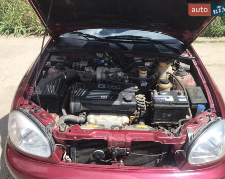 Червоний Деу Ланос, об'ємом двигуна 1.6 л та пробігом 300 тис. км за 2700 $, фото 1 на Automoto.ua
