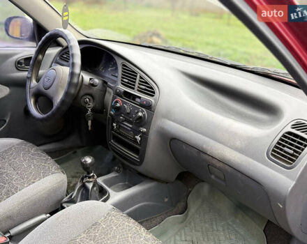 Красный Дэу Ланос, объемом двигателя 1.5 л и пробегом 224 тыс. км за 1750 $, фото 8 на Automoto.ua