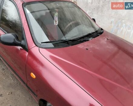 Красный Дэу Ланос, объемом двигателя 1.5 л и пробегом 191 тыс. км за 2500 $, фото 7 на Automoto.ua