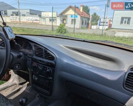 Красный Дэу Ланос, объемом двигателя 1.5 л и пробегом 205 тыс. км за 3000 $, фото 26 на Automoto.ua