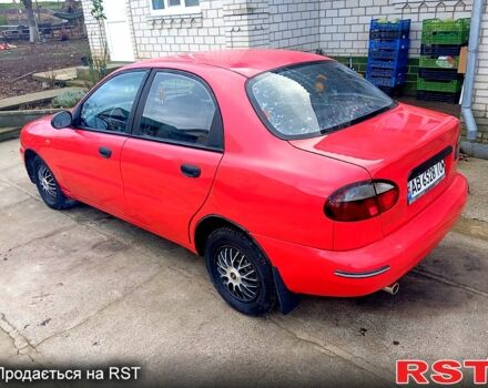 Красный Дэу Ланос, объемом двигателя 1.5 л и пробегом 350 тыс. км за 2000 $, фото 1 на Automoto.ua