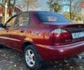 Красный Дэу Ланос, объемом двигателя 1.6 л и пробегом 216 тыс. км за 1900 $, фото 6 на Automoto.ua
