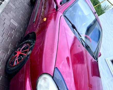 Красный Дэу Ланос, объемом двигателя 1.5 л и пробегом 61 тыс. км за 2800 $, фото 3 на Automoto.ua