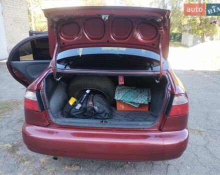 Красный Дэу Ланос, объемом двигателя 1.5 л и пробегом 322 тыс. км за 2200 $, фото 6 на Automoto.ua