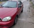 Красный Дэу Ланос, объемом двигателя 1.5 л и пробегом 309 тыс. км за 2100 $, фото 1 на Automoto.ua