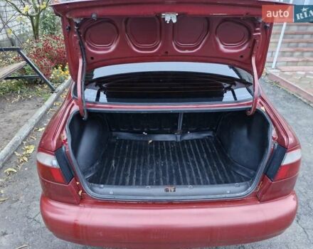 Красный Дэу Ланос, объемом двигателя 1.6 л и пробегом 163 тыс. км за 2650 $, фото 12 на Automoto.ua