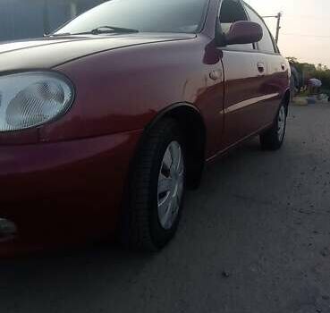 Красный Дэу Ланос, объемом двигателя 1.6 л и пробегом 280 тыс. км за 2600 $, фото 2 на Automoto.ua