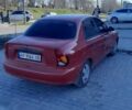 Красный Дэу Ланос, объемом двигателя 1.5 л и пробегом 151 тыс. км за 2100 $, фото 1 на Automoto.ua