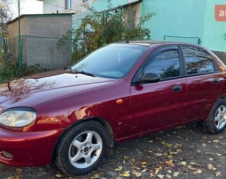 Красный Дэу Ланос, объемом двигателя 1.6 л и пробегом 216 тыс. км за 1900 $, фото 3 на Automoto.ua