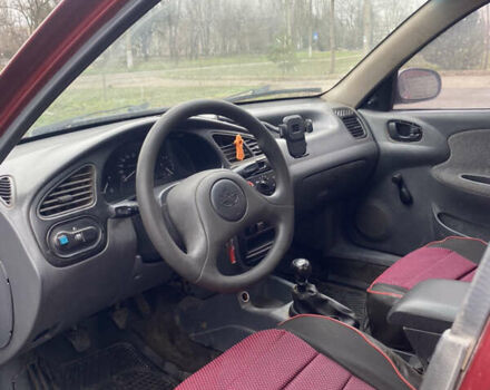 Красный Дэу Ланос, объемом двигателя 1.5 л и пробегом 250 тыс. км за 1450 $, фото 4 на Automoto.ua