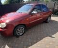 Красный Дэу Ланос, объемом двигателя 1.5 л и пробегом 253 тыс. км за 1700 $, фото 1 на Automoto.ua