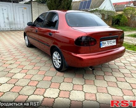 Красный Дэу Ланос, объемом двигателя 1.5 л и пробегом 190 тыс. км за 2650 $, фото 3 на Automoto.ua