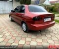 Красный Дэу Ланос, объемом двигателя 1.5 л и пробегом 190 тыс. км за 2650 $, фото 3 на Automoto.ua