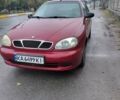 Красный Дэу Ланос, объемом двигателя 1.5 л и пробегом 309 тыс. км за 2100 $, фото 1 на Automoto.ua