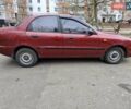Красный Дэу Ланос, объемом двигателя 1.5 л и пробегом 146 тыс. км за 2300 $, фото 2 на Automoto.ua