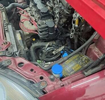 Красный Дэу Ланос, объемом двигателя 1.5 л и пробегом 309 тыс. км за 2000 $, фото 12 на Automoto.ua