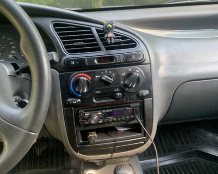 Красный Дэу Ланос, объемом двигателя 1.5 л и пробегом 348 тыс. км за 2000 $, фото 3 на Automoto.ua