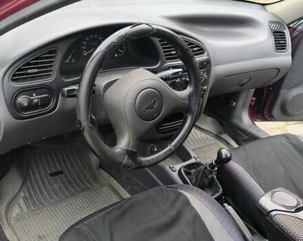 Красный Дэу Ланос, объемом двигателя 1.5 л и пробегом 128 тыс. км за 3550 $, фото 8 на Automoto.ua