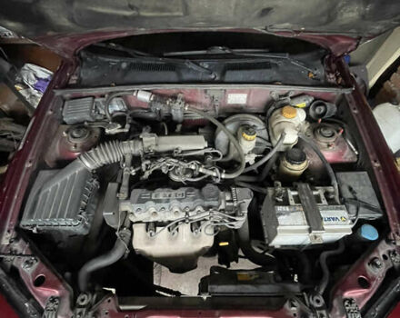 Красный Дэу Ланос, объемом двигателя 1.5 л и пробегом 399 тыс. км за 2499 $, фото 1 на Automoto.ua