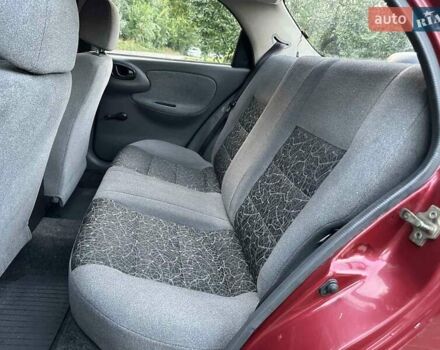Красный Дэу Ланос, объемом двигателя 1.5 л и пробегом 265 тыс. км за 2300 $, фото 5 на Automoto.ua