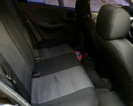 Красный Дэу Ланос, объемом двигателя 1.5 л и пробегом 116 тыс. км за 3500 $, фото 11 на Automoto.ua