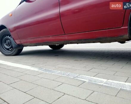 Красный Дэу Ланос, объемом двигателя 1.5 л и пробегом 322 тыс. км за 2300 $, фото 9 на Automoto.ua