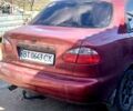 Красный Дэу Ланос, объемом двигателя 1.5 л и пробегом 252 тыс. км за 2600 $, фото 1 на Automoto.ua