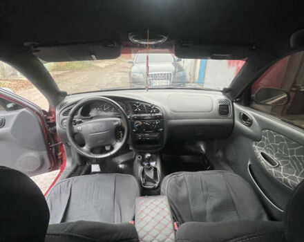 Красный Дэу Ланос, объемом двигателя 1.5 л и пробегом 399 тыс. км за 2499 $, фото 14 на Automoto.ua