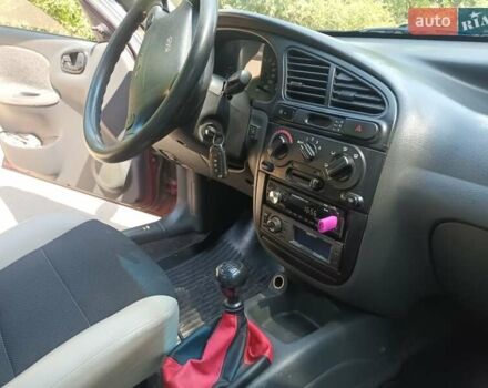 Красный Дэу Ланос, объемом двигателя 1.6 л и пробегом 304 тыс. км за 2900 $, фото 9 на Automoto.ua