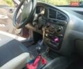 Красный Дэу Ланос, объемом двигателя 1.6 л и пробегом 304 тыс. км за 2900 $, фото 9 на Automoto.ua