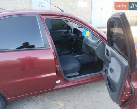 Красный Дэу Ланос, объемом двигателя 1.5 л и пробегом 322 тыс. км за 2200 $, фото 1 на Automoto.ua