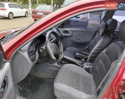 Красный Дэу Ланос, объемом двигателя 1.5 л и пробегом 183 тыс. км за 2850 $, фото 21 на Automoto.ua