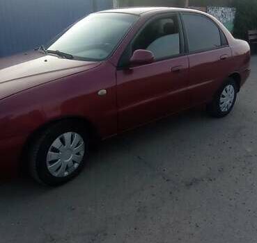 Красный Дэу Ланос, объемом двигателя 1.6 л и пробегом 280 тыс. км за 2600 $, фото 3 на Automoto.ua