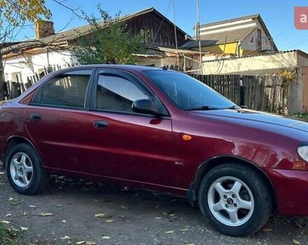Красный Дэу Ланос, объемом двигателя 1.6 л и пробегом 216 тыс. км за 1900 $, фото 10 на Automoto.ua