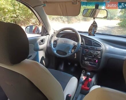 Красный Дэу Ланос, объемом двигателя 1.6 л и пробегом 304 тыс. км за 2900 $, фото 10 на Automoto.ua