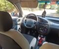 Красный Дэу Ланос, объемом двигателя 1.6 л и пробегом 304 тыс. км за 2900 $, фото 10 на Automoto.ua