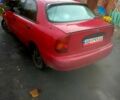 Красный Дэу Ланос, объемом двигателя 1.5 л и пробегом 230 тыс. км за 1500 $, фото 1 на Automoto.ua