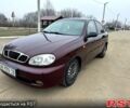 Красный Дэу Ланос, объемом двигателя 1.5 л и пробегом 220 тыс. км за 2350 $, фото 1 на Automoto.ua