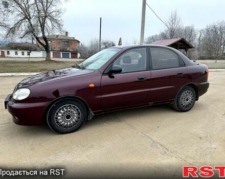 Красный Дэу Ланос, объемом двигателя 1.5 л и пробегом 220 тыс. км за 2350 $, фото 3 на Automoto.ua