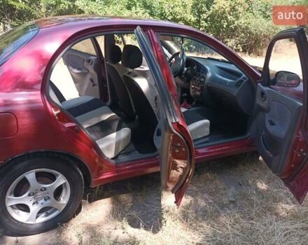 Красный Дэу Ланос, объемом двигателя 1.6 л и пробегом 304 тыс. км за 2900 $, фото 8 на Automoto.ua