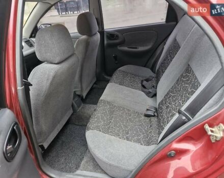 Красный Дэу Ланос, объемом двигателя 1.5 л и пробегом 146 тыс. км за 2300 $, фото 6 на Automoto.ua