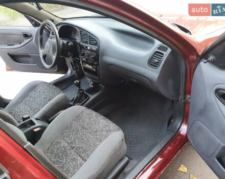 Красный Дэу Ланос, объемом двигателя 1.5 л и пробегом 270 тыс. км за 2450 $, фото 8 на Automoto.ua