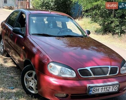 Красный Дэу Ланос, объемом двигателя 1.6 л и пробегом 304 тыс. км за 2900 $, фото 3 на Automoto.ua